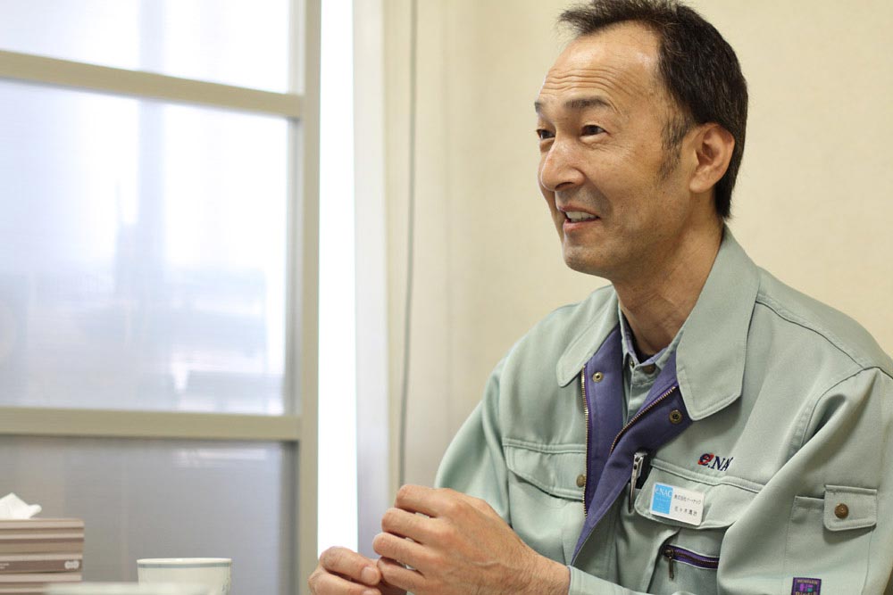 イー・ナック担当 佐々木