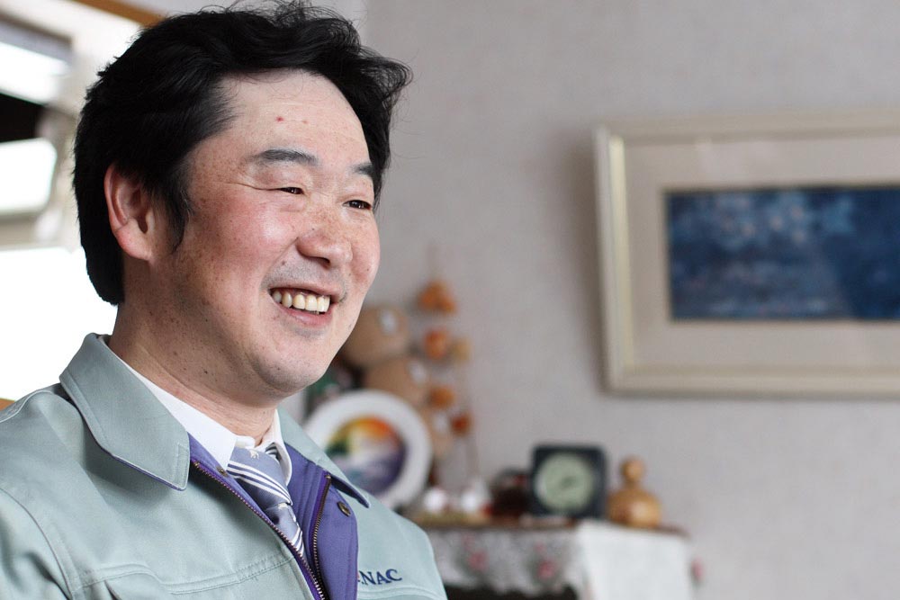 イー・ナック担当 柳